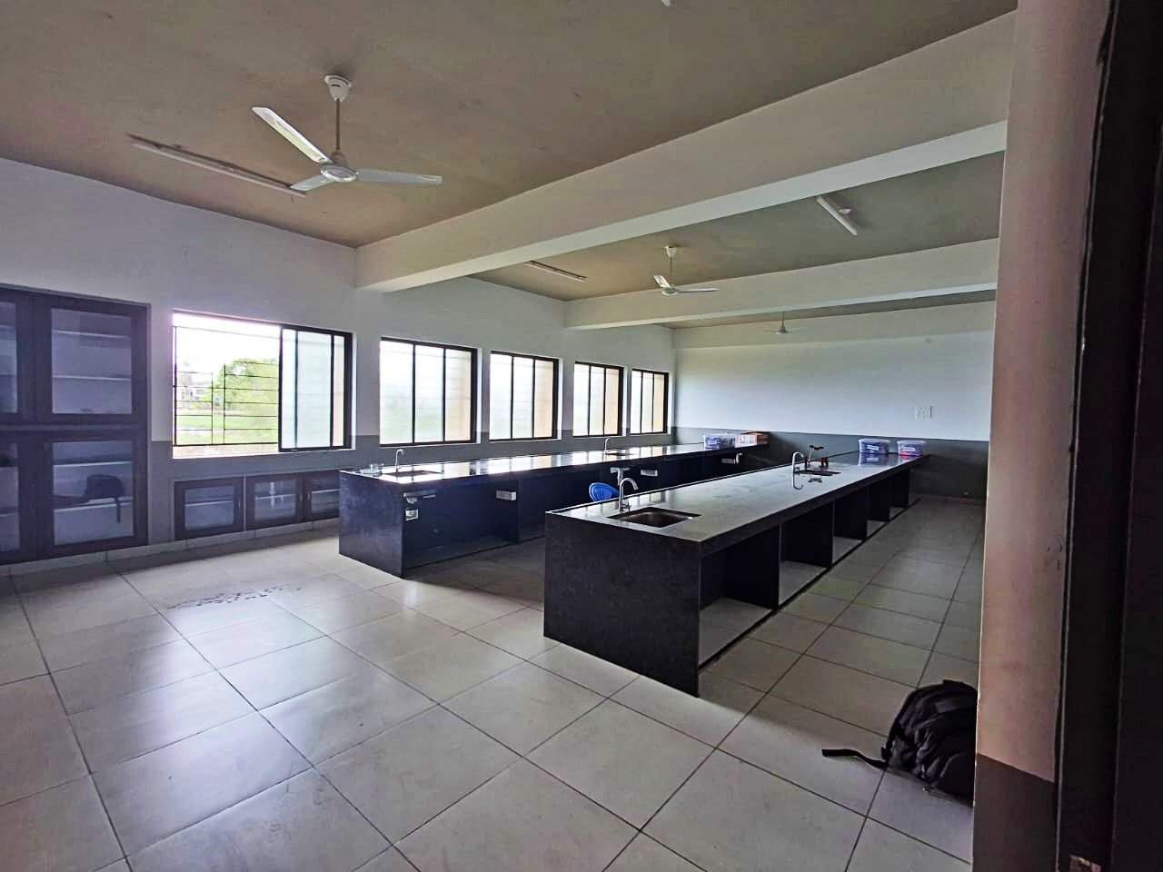 Students conducting experiments in the modern science laboratory